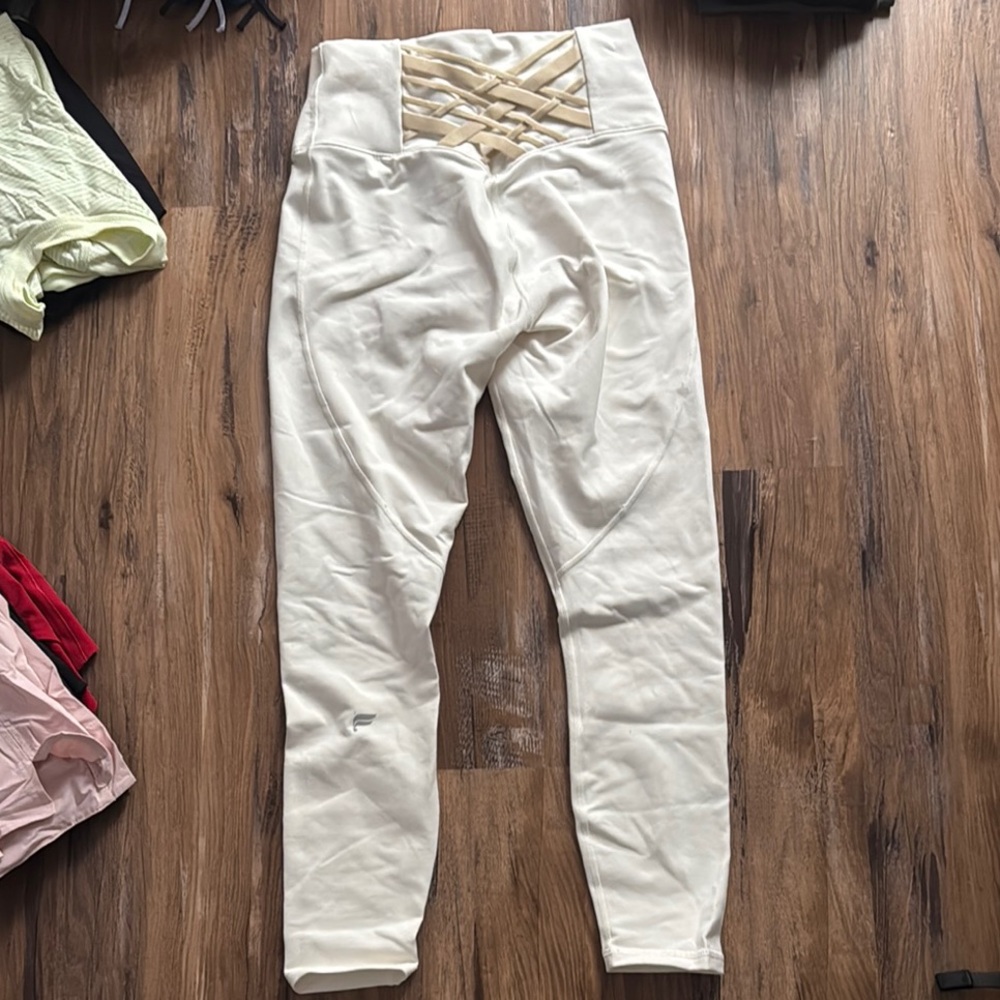 Fabletics Power Hold High-Waisted Cream Leggings with Gold Detail